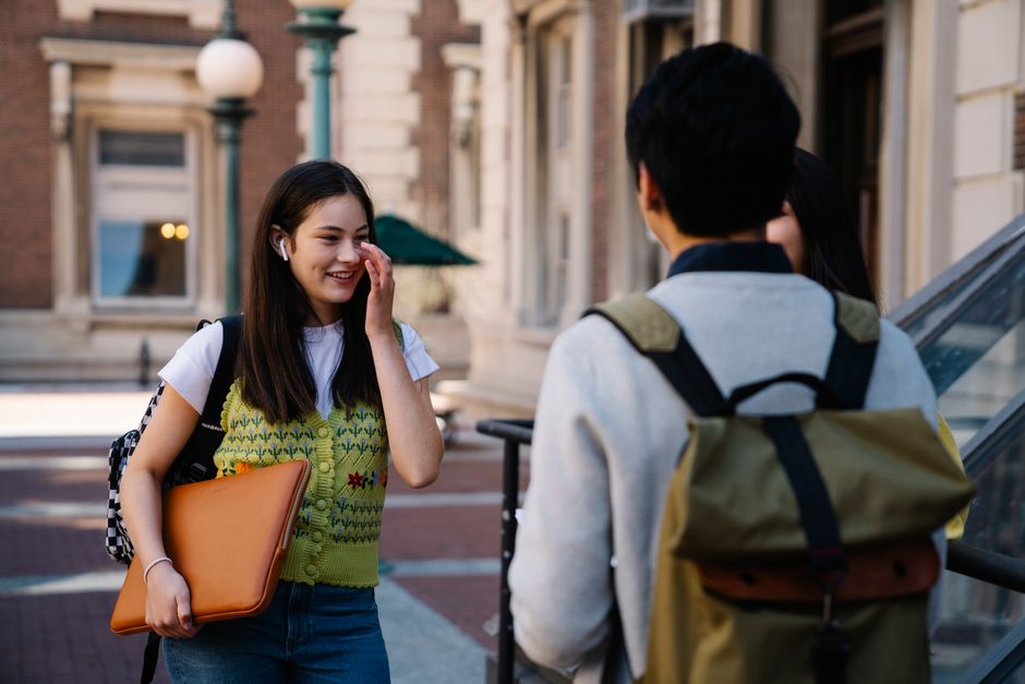 Young students engaging and socializing on a vibrant university campus.